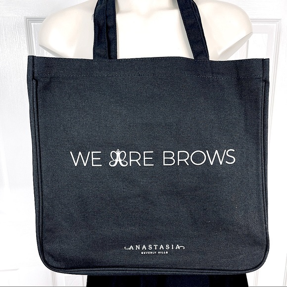 Anastasia Beverly Hills Handbags - ANASTASIA Beverly Hills we are brows black canvas tote bag brows on point always